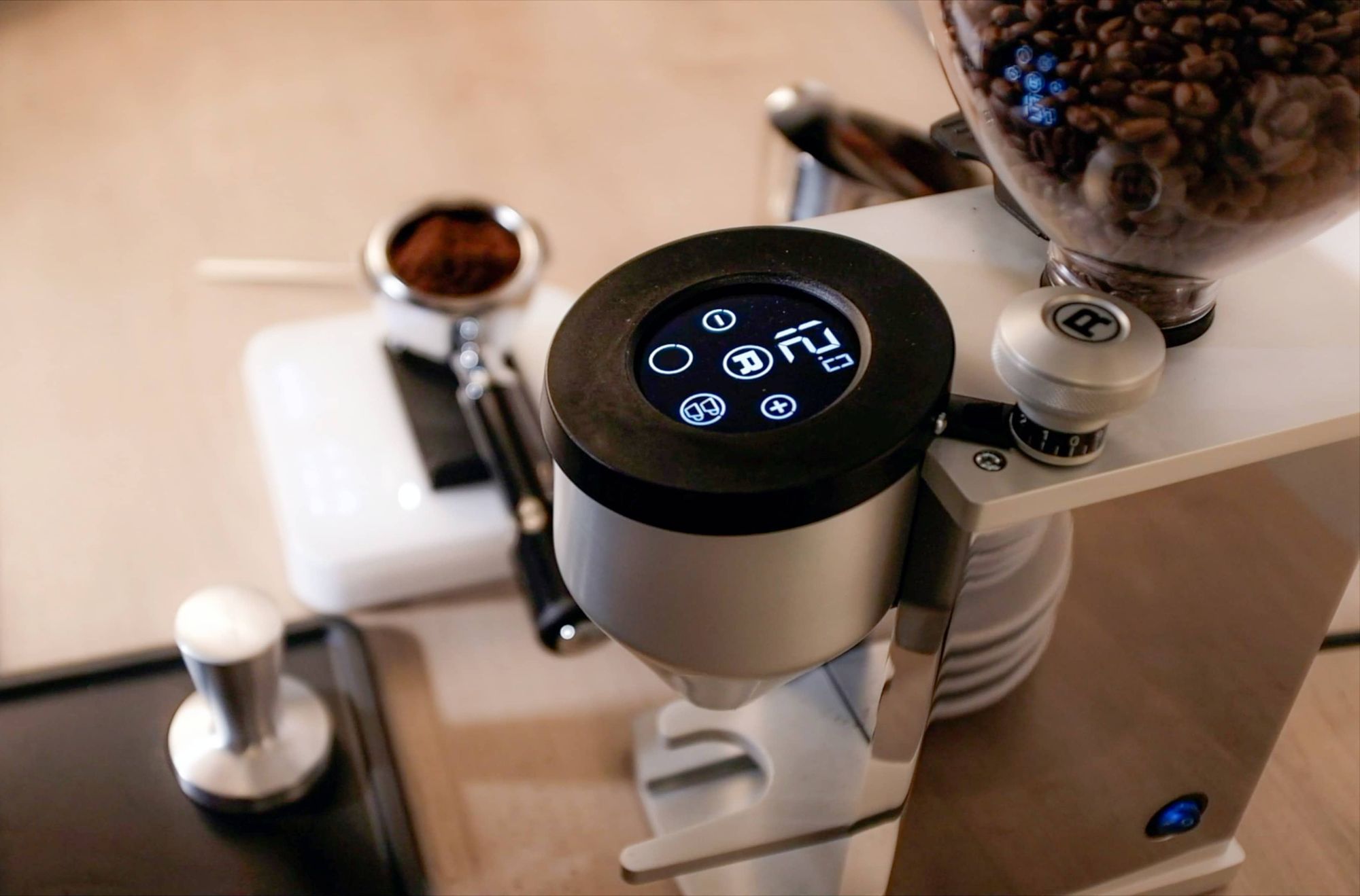 close shot of an automatic coffee grinder